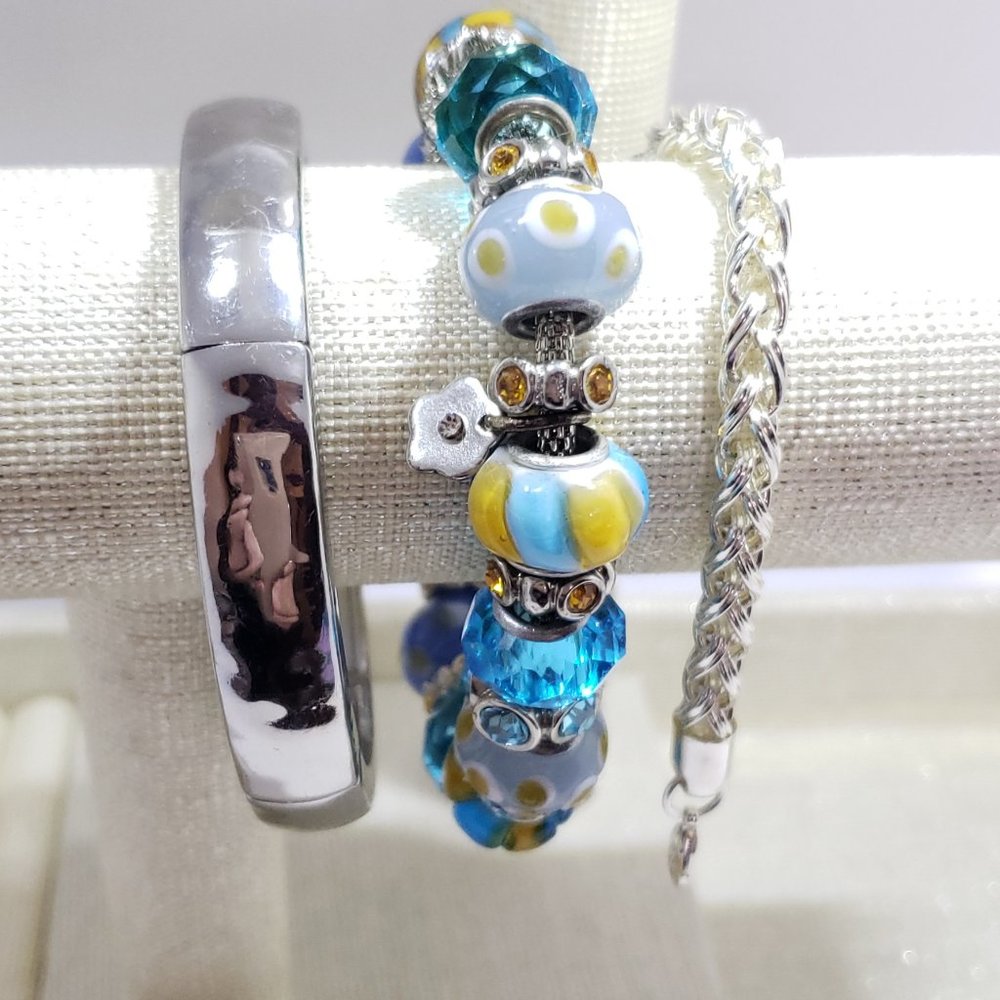 SILVER AND PANDA STYLE BRACELETS